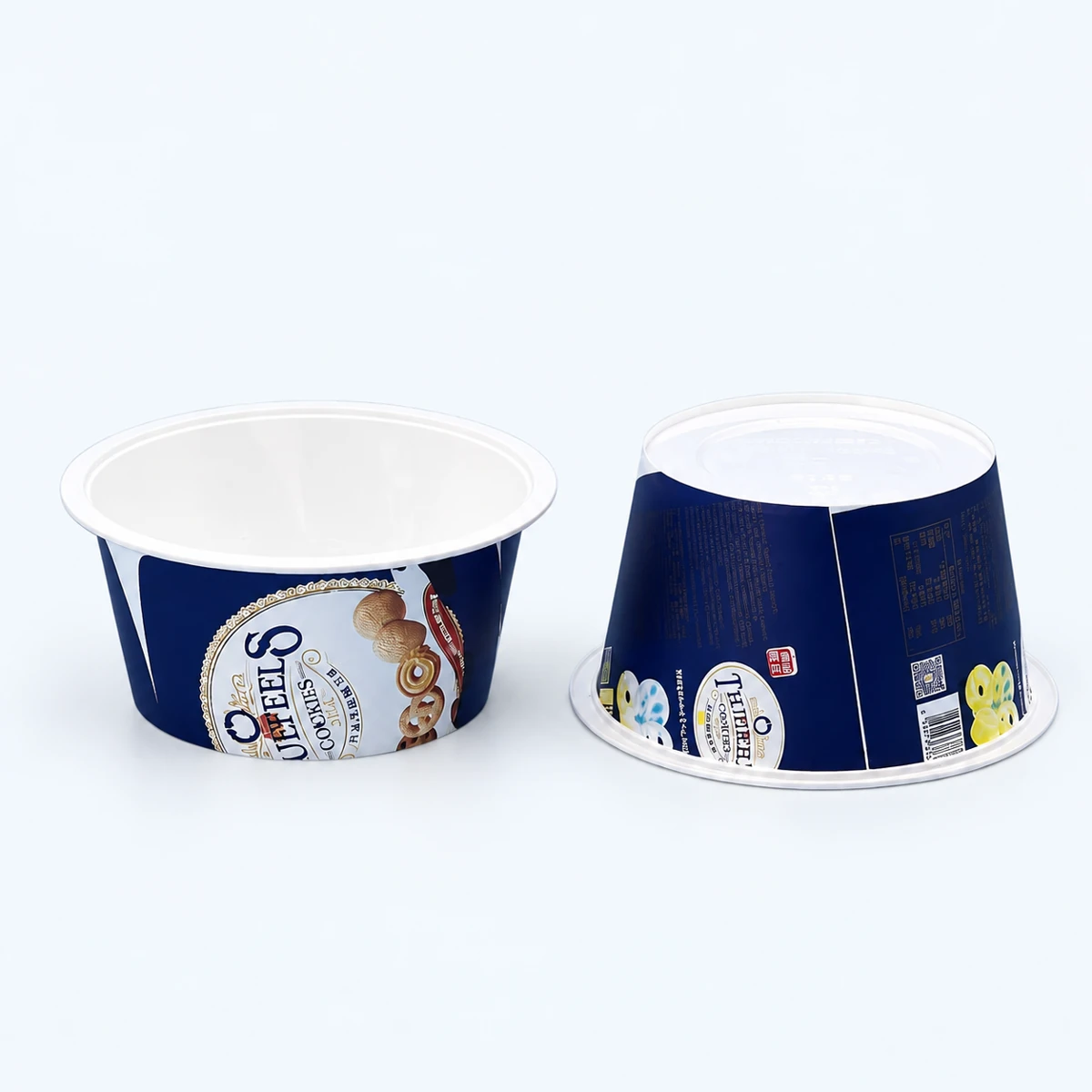 Round printed plastic tubs showing the body label and base