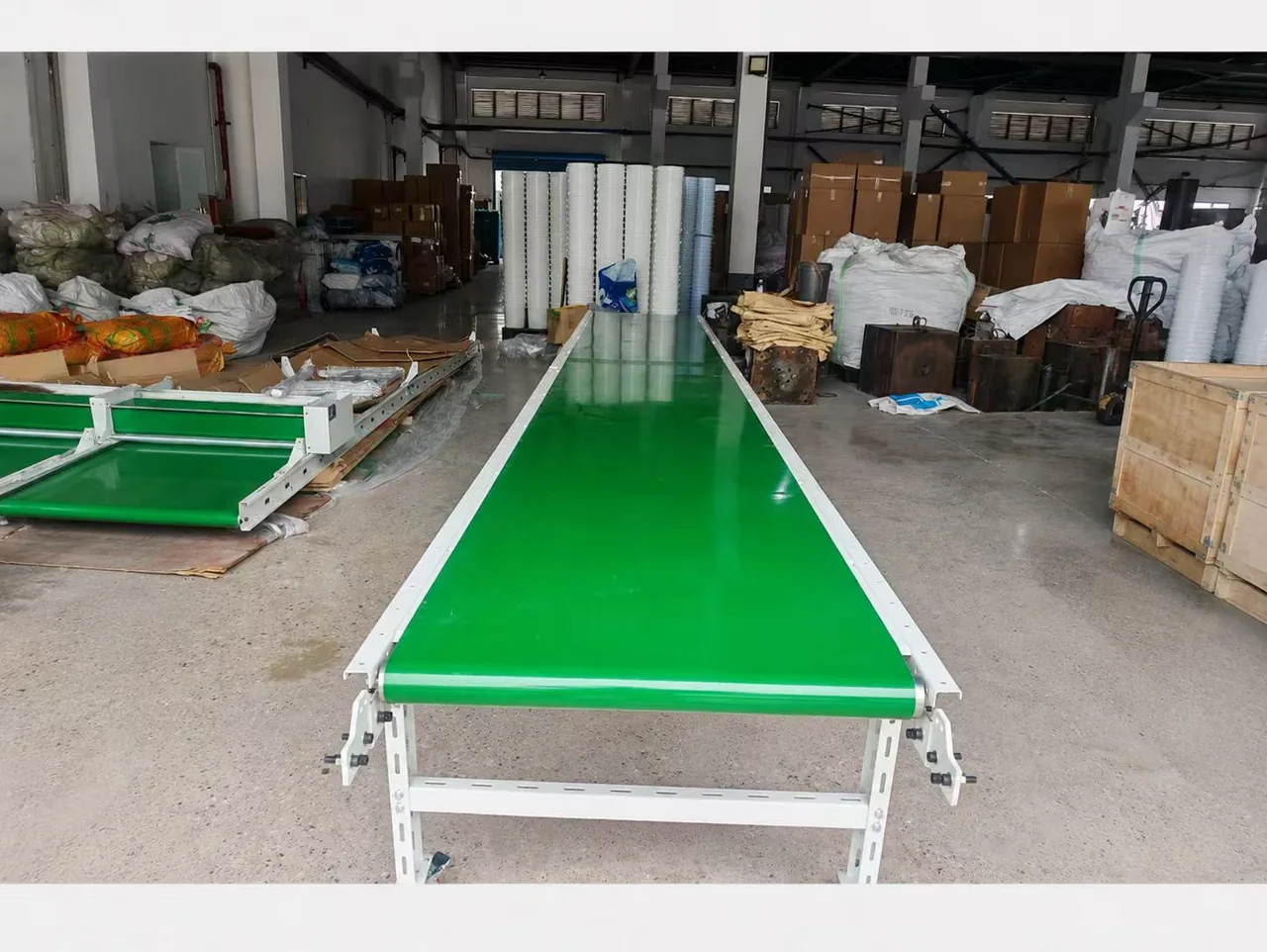 A conveyor and molding equipment in a production workshop