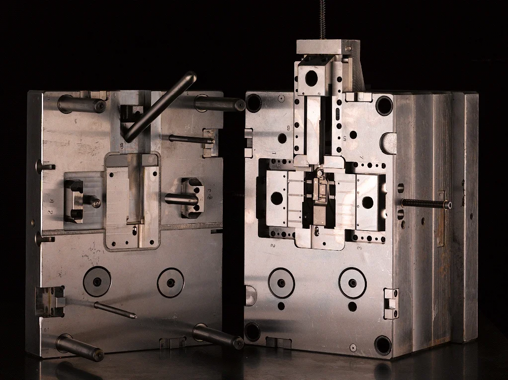 Injection mold halves — third-party photographic reference