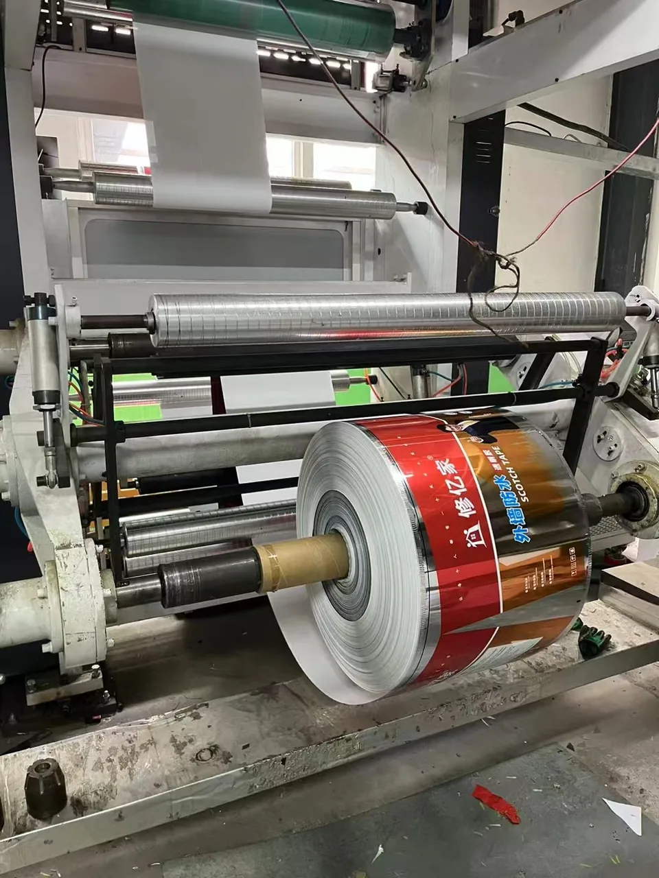 Printing equipment with rolls of printed label film