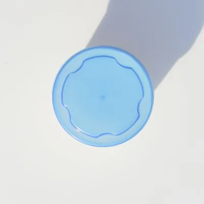 Blue round lid showing the perimeter and raised rim